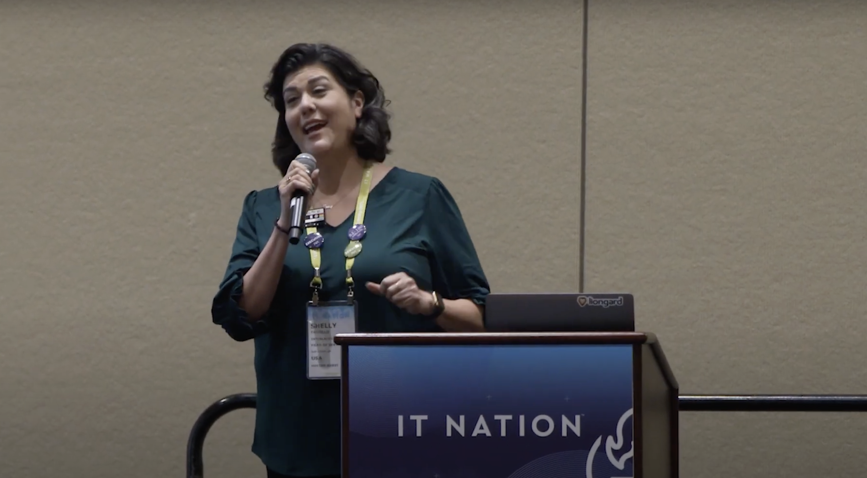 Shelly Trujillo speaking at a lectern